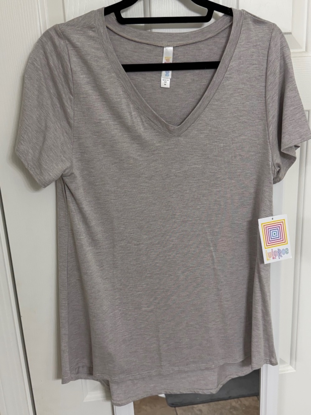 NWT - LulaRoe Christy T- short sleeve top (M)